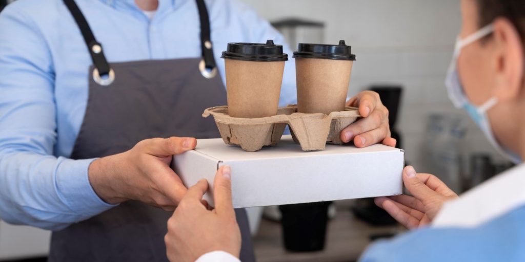 female customer getting her takeaway food
