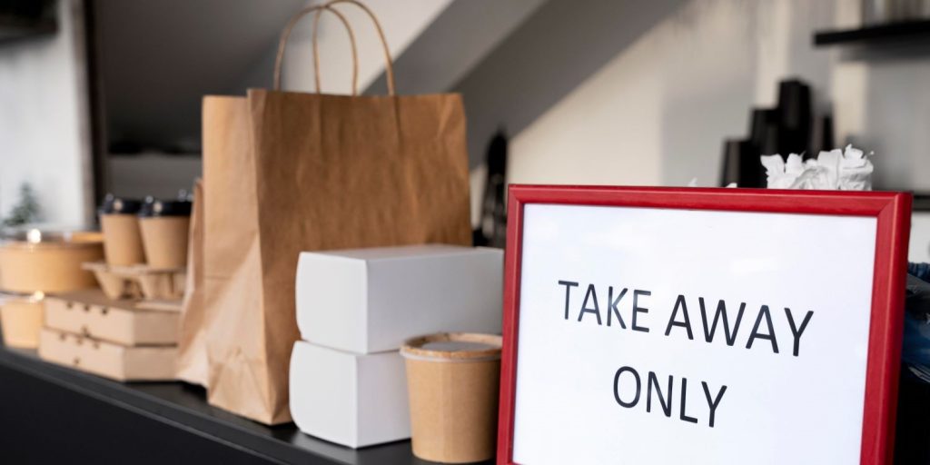 front view packed food with takeaway only sign