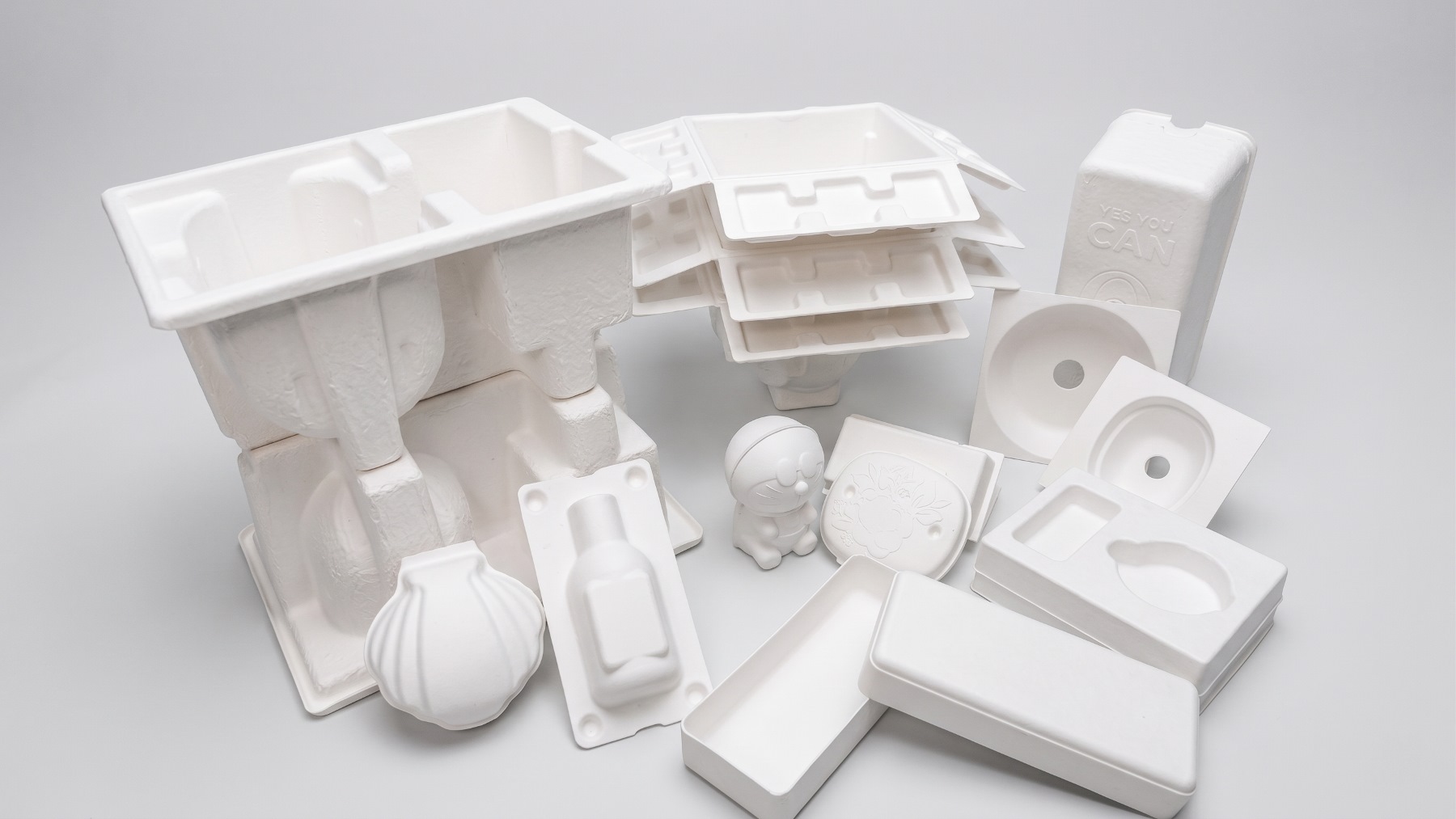 group photo of custom pulp molded packaging